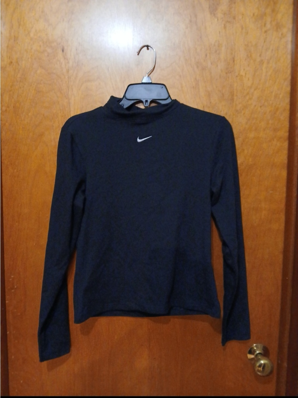 Nike Women's Black Long Sleeve Mock Neck Top with White Swoosh